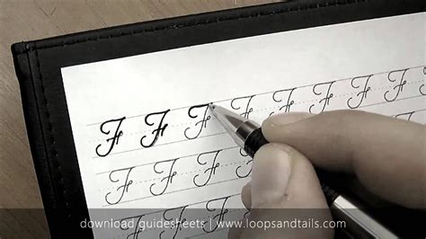 how to write cursive f: